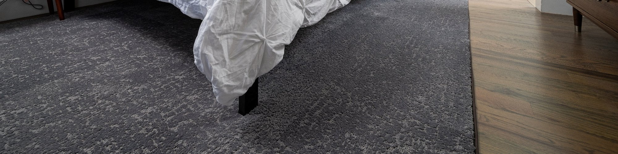 Bed On An Area Rug from King Carpet Plus in Plainview